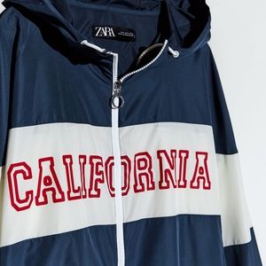 Zara Blue/White "California" Front Text Raincoat. Size L